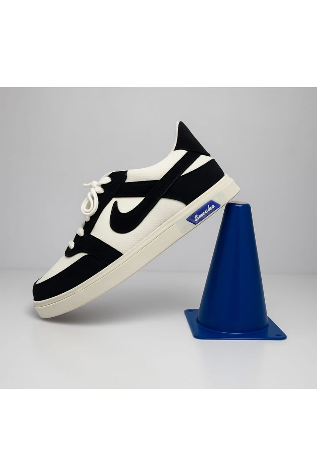 Stylish casual sneakers on blue cone display