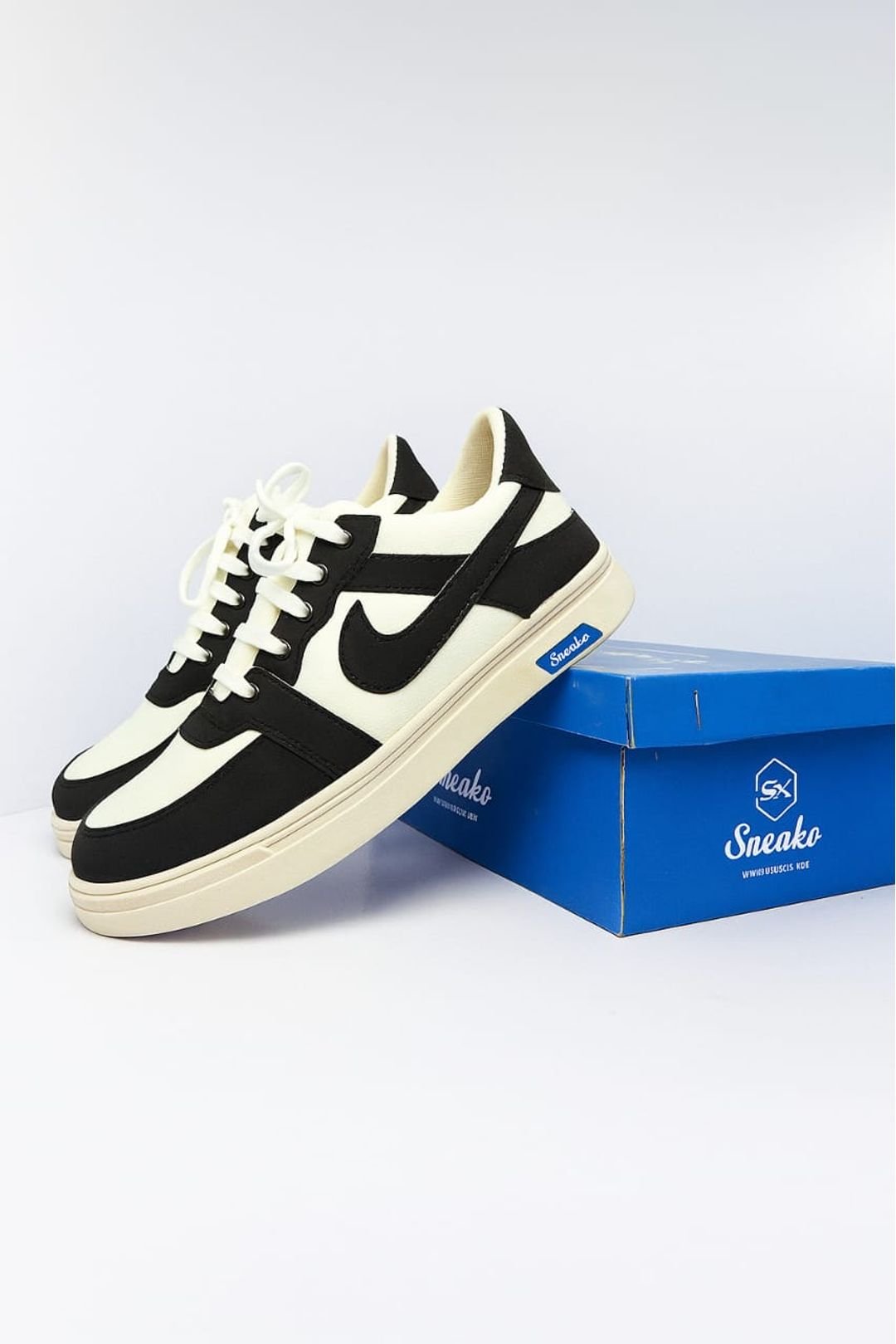 Stylish casual sneakers on blue cone display